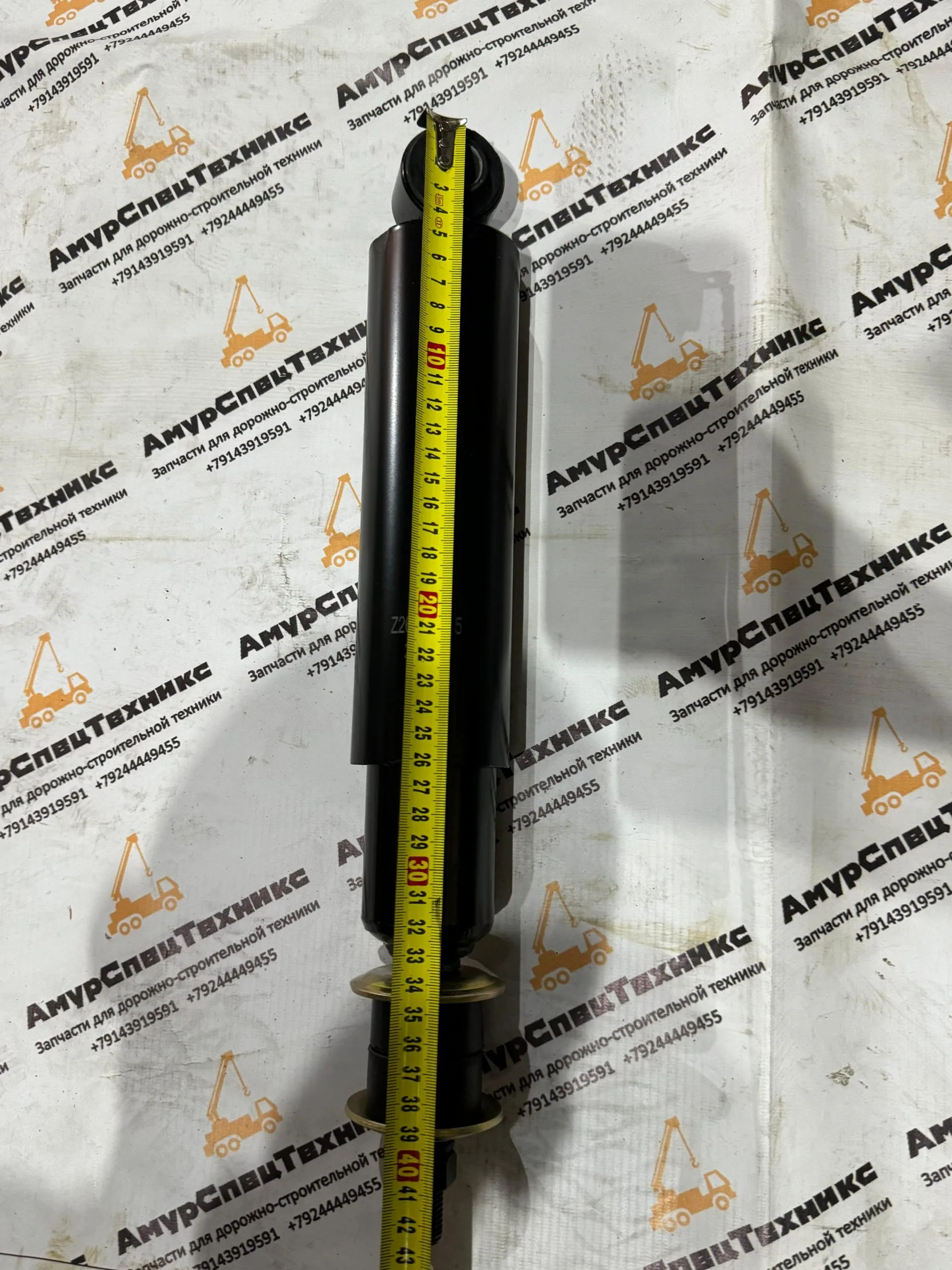 Амортизатор задний 860501448 на автокран XCMG
